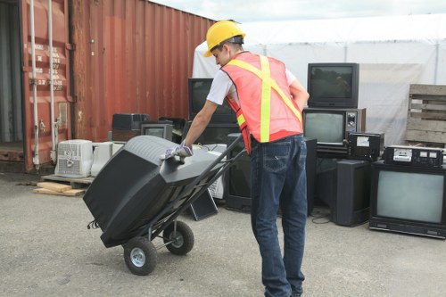 Office furniture being removed during clearance