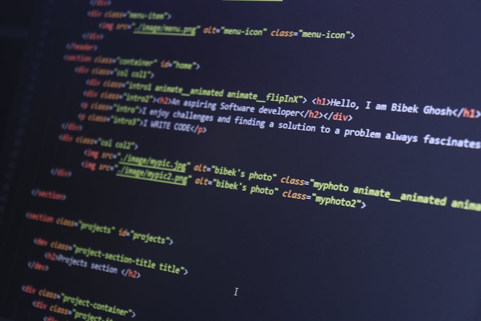 A close-up photograph of a computer screen displaying lines of colorful coding text in a dark-themed editor. The code includes CSS style definitions with properties such as width, margin-top, font-wei